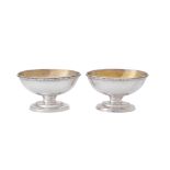 A pair of George III silver pedestal oval salt cellars by William Abdy I