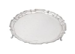 A silver shaped circular salver by Duncan & Scobbie