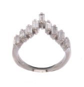A diamond ring of wishbone design