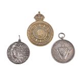 Three early motorcycle and car racing medals