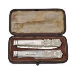 ϒ A Victorian silver and mother of pearl travelling fruit knife and fork by Aaron Hadfield