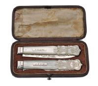 ϒ A Victorian silver and mother of pearl travelling fruit knife and fork by Aaron Hadfield