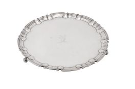 A late Victorian silver shaped circular salver by William Hutton & Sons Ltd