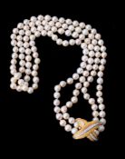 A four row cultured pearl necklace to a gold coloured diamond set clasp
