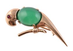 A 1950s 9 carat gold, green chalcedony and ruby parrot brooch by Hans Georg Mautner