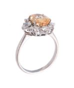 A topaz and diamond cluster ring