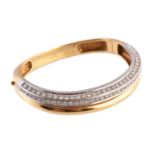 A diamond bangle by Bucherer