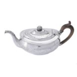 A George III Irish silver oval tea pot by Robert Breading