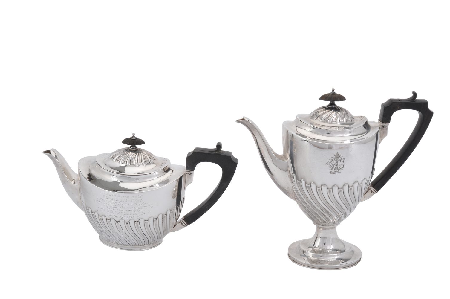 A Victorian silver oval pedestal tea pot and coffee pot by Elkington & Co.