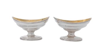 A pair of George III silver pedestal oval salt cellars by William Abdy II