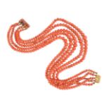 ϒ A five strand coral (corallium rubrum) bead necklace