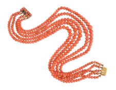 ϒ A five strand coral (corallium rubrum) bead necklace