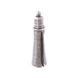 A silver novelty lighthouse combination pencil, penknife and button hook