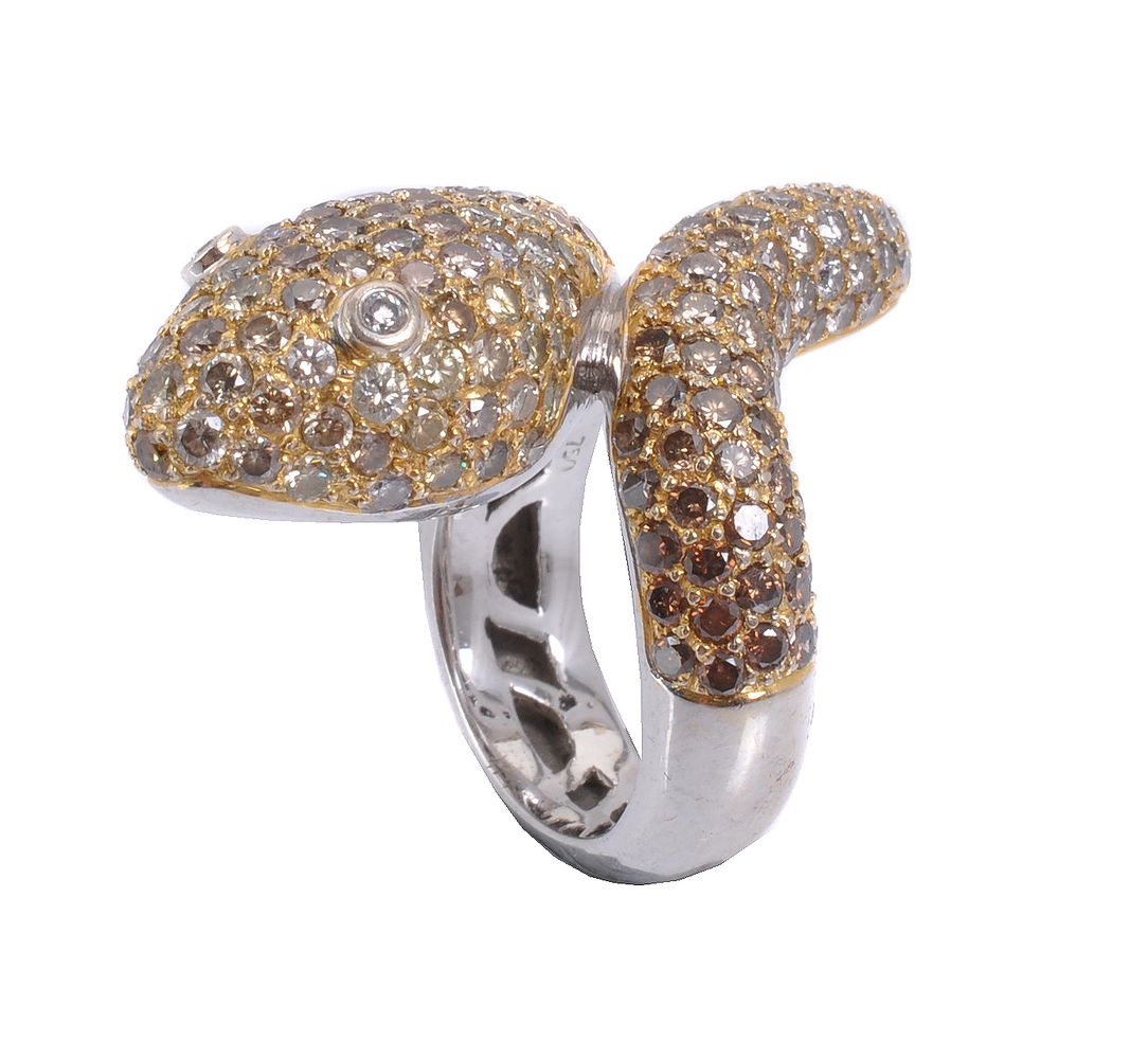 A diamond serpent dress ring