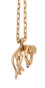 An 18 carat gold panthère pendant by Cartier