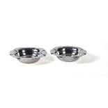 A pair of Edwardian silver octolobed bowls by Atkin Brothers