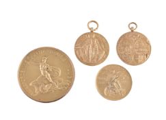 Four early motorcycling gold prize medals