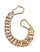 An entwined double curb link bracelet by Pomellato