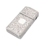 A Victorian silver rectangular vesta case, cutter and pricker by Benjamin Barling