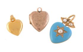 An early 20th century enamel, pearl and diamond heart shaped pendant