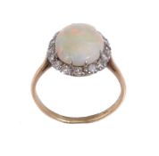 An opal and diamond ring