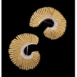 A pair of 1960s gold coloured and diamond brooches