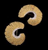 A pair of 1960s gold coloured and diamond brooches