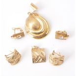 A small collection of gold coloured jewellery