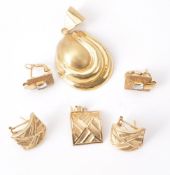 A small collection of gold coloured jewellery