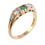 A five stone emerald and diamond ring