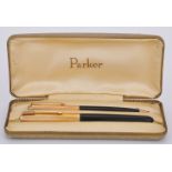 Parker, 51, a black fountain pen and propelling pencil