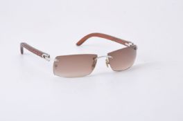 Cartier, C Decor, a pair of sunglasses