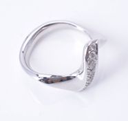 A diamond ring of wishbone design