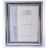 A silver mounted photo frame by Carr's of Sheffield Ltd.