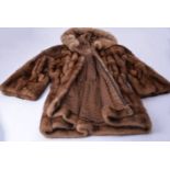 De Carlis, Roma, a fur hooded fur coat