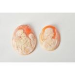 Two unmounted shell cameo plaques each of oval shape and carved to depict a religious scene