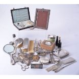 A group of silver coloured items and other objects