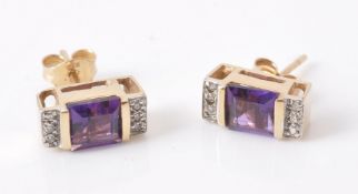 A pair of amethyst and diamond ear studs