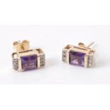 A pair of amethyst and diamond ear studs