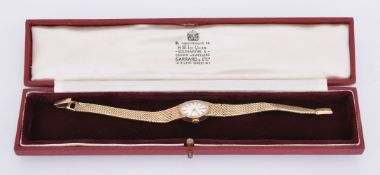 Omega,Lady's 9 carat gold bracelet watch
