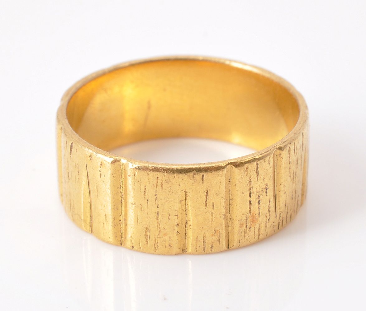 A late 1960s 22 carat gold band ring