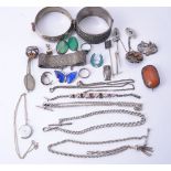 A collection of silver set jewellery including an opal and garnet bracelet