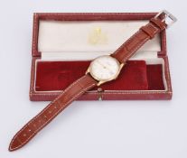 Garrard, 9 carat gold wrist watch