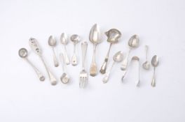 A small collection of silver flatware