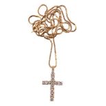 A diamond cross pendant