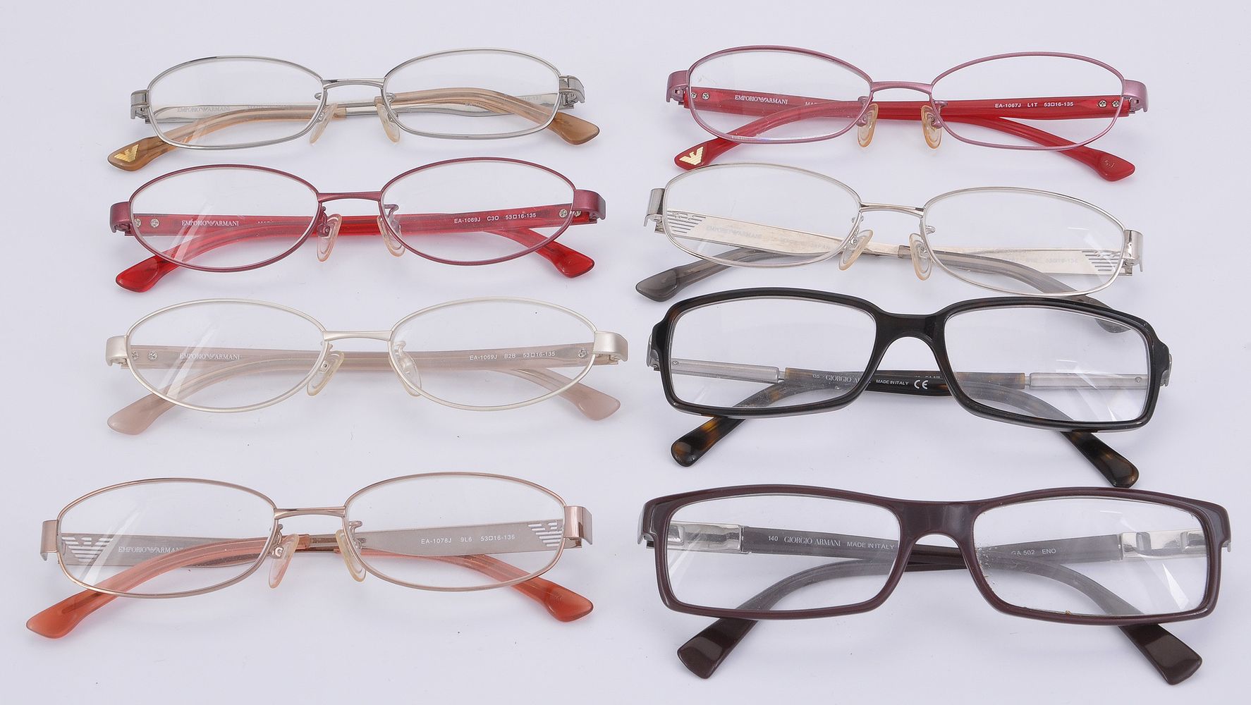 A collection of Emporio and Giorgio Armani reading glasses