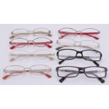 A collection of Emporio and Giorgio Armani reading glasses