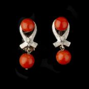 ϒ A pair of coral and diamond ear clips