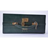 Asprey, a green leather travelling case