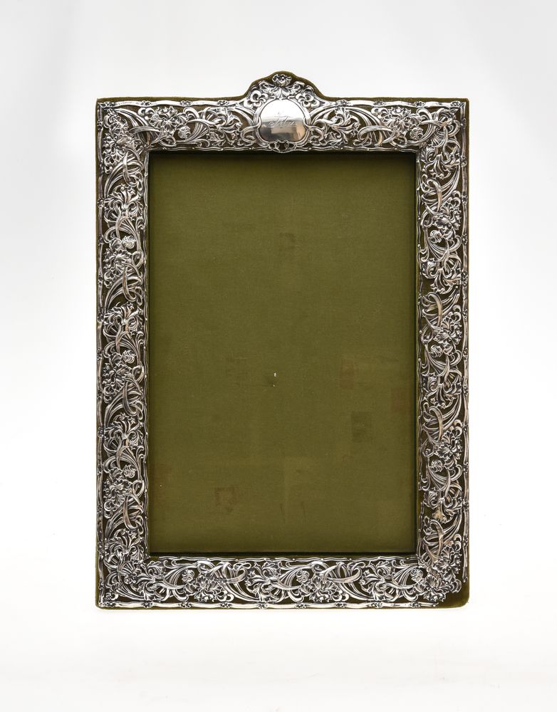 An Edwardian silver mounted large photograph frame by Henry Matthews